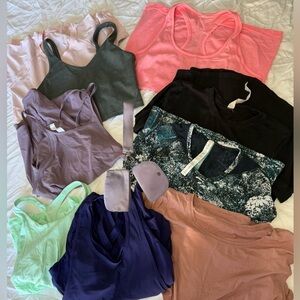 Lululemon Lot shirts/tanks 9 total variety sizes includes bonus wristlet!
